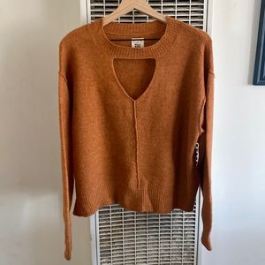 Billabong. Size large. Terracotta sweater.